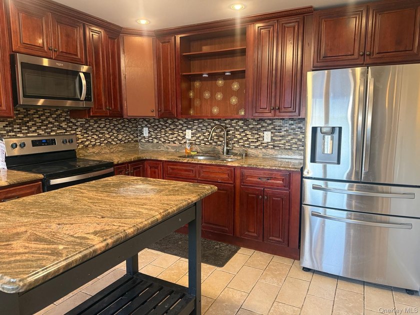 Welcome to this beautifully updated cape-style home situated on - photo 7