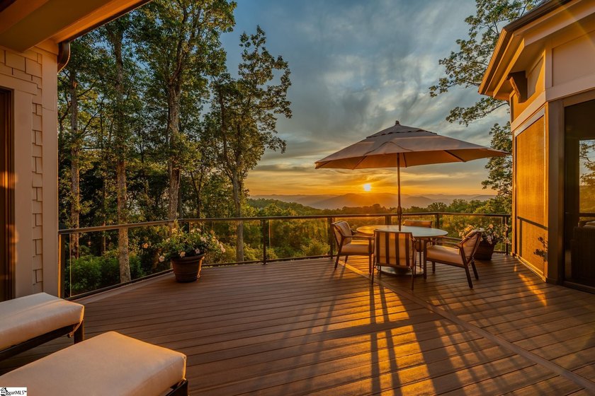 Some homes have a view. This one has a horizon. Sited on one of - photo 3