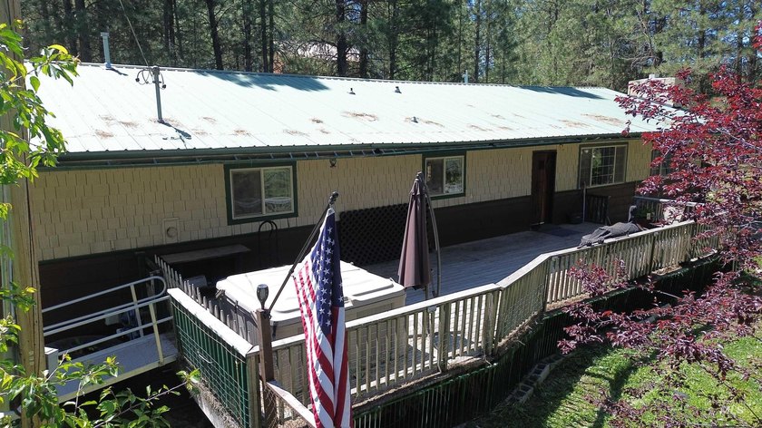 Private 1.4 +/- acre wooded parcel is located on the outskirts - photo 3