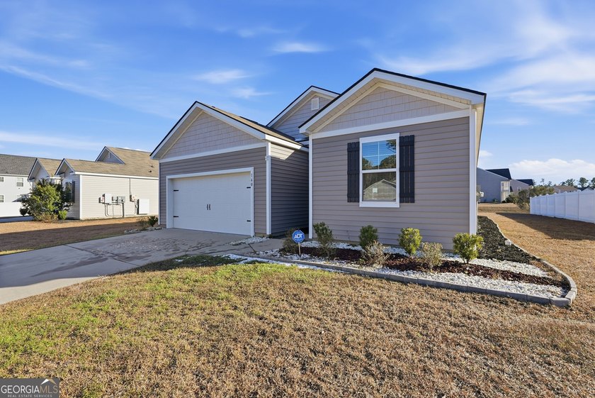 Nestled in a sought-after gated community off Highlands Blvd - photo 2