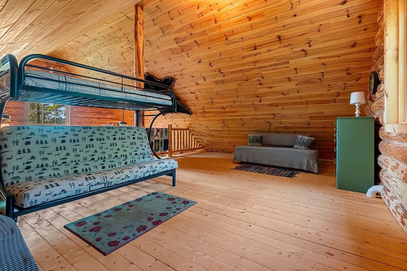 Experience true Northwoods living in this beautiful full log - photo 30