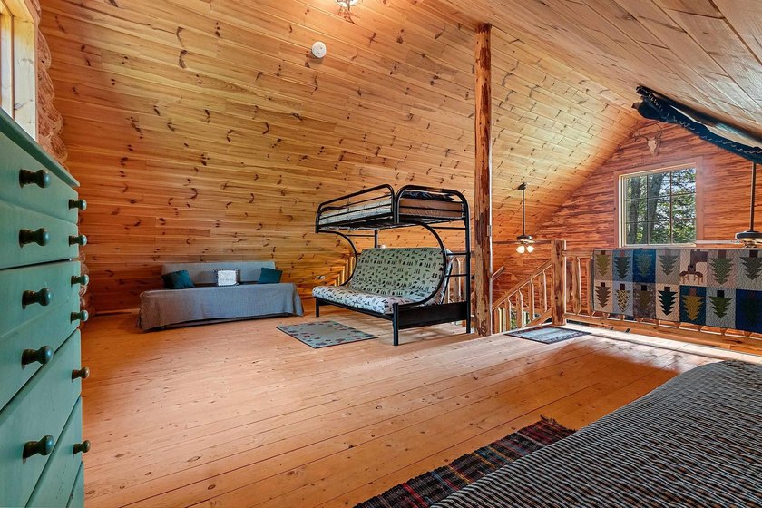 Experience true Northwoods living in this beautiful full log - photo 32