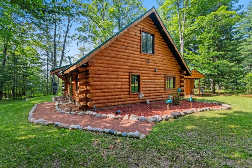 Experience true Northwoods living in this beautiful full log - photo 34