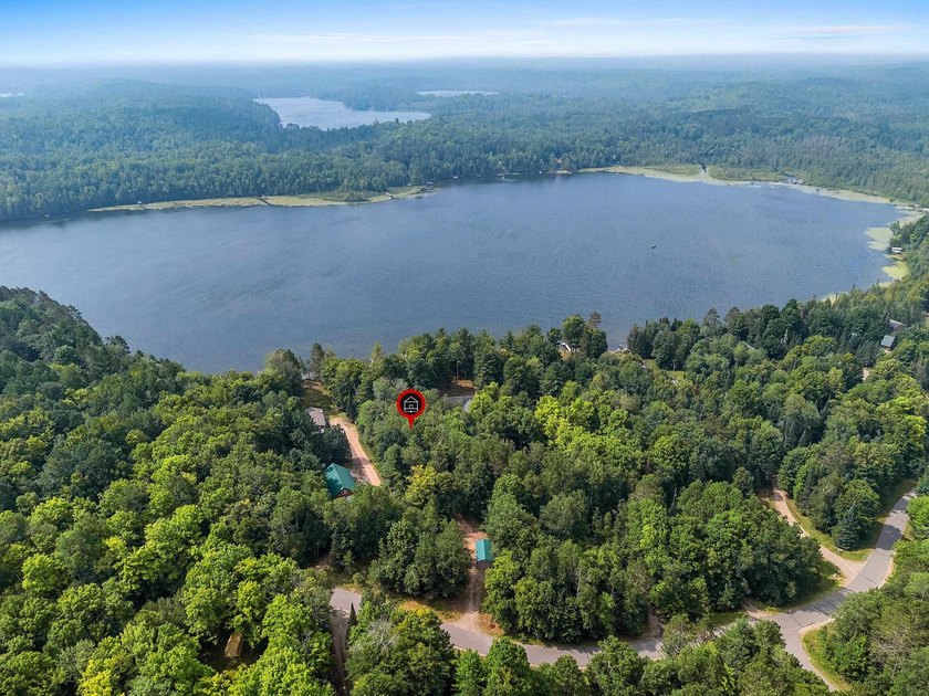 Experience true Northwoods living in this beautiful full log - photo 37