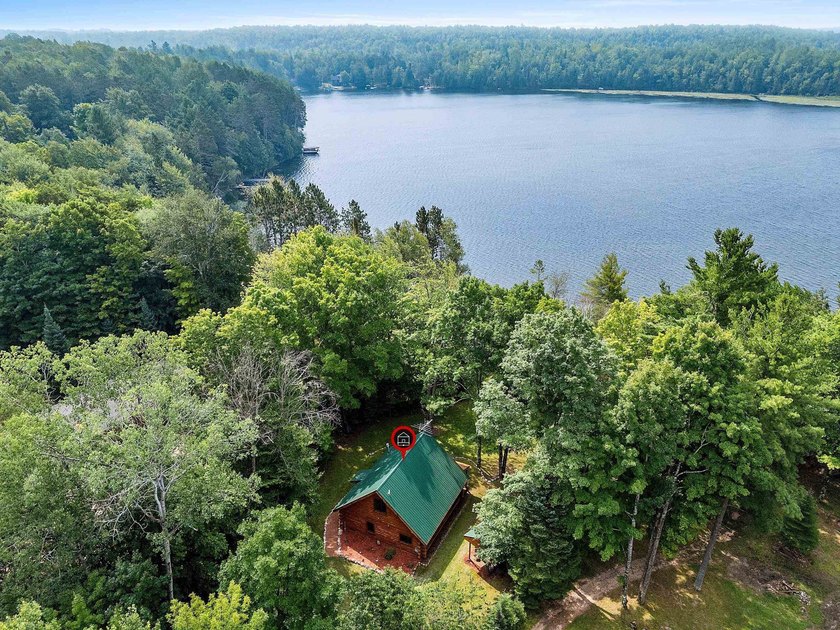 Experience true Northwoods living in this beautiful full log - photo 39