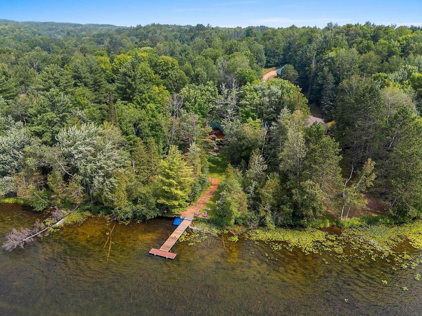 Experience true Northwoods living in this beautiful full log - photo 42