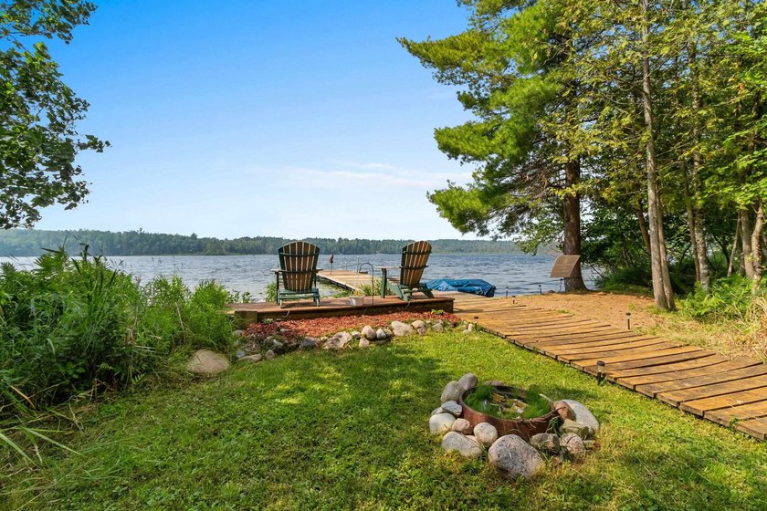 Experience true Northwoods living in this beautiful full log - photo 45