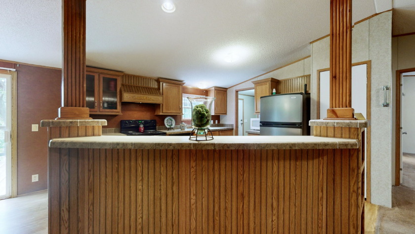 Home with 3.2 acres near lake with 3 campsites. - photo 10
