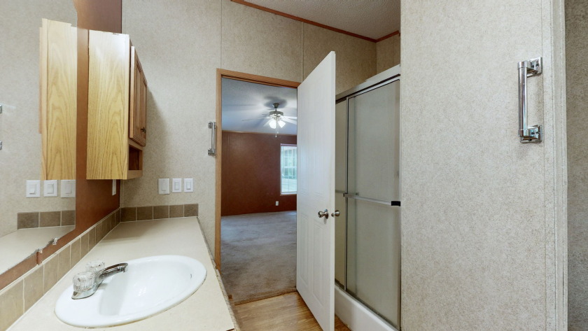 Home with 3.2 acres near lake with 3 campsites. - photo 16