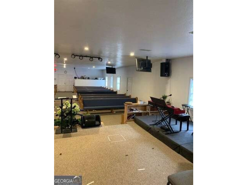 Two buildings zoned commercial currently an established church - photo 8