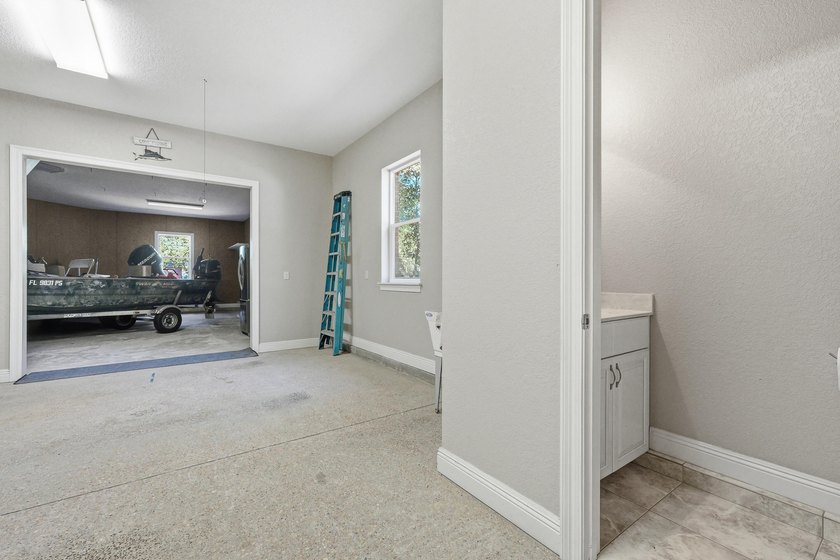 Custom-built home with flexible living space, oversized 3-car - photo 10