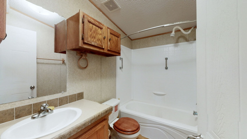 Home with 3.2 acres near lake with 3 campsites. - photo 22