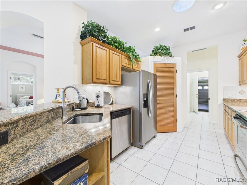 Beautiful Pool Home in Rainbow Springs Country Club Nestled in - photo 11