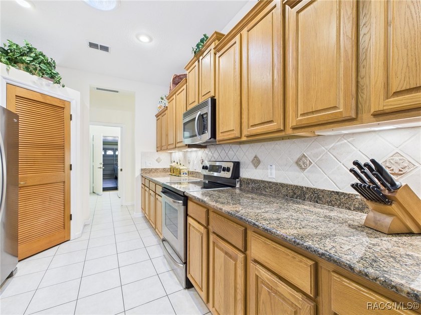 Beautiful Pool Home in Rainbow Springs Country Club Nestled in - photo 12