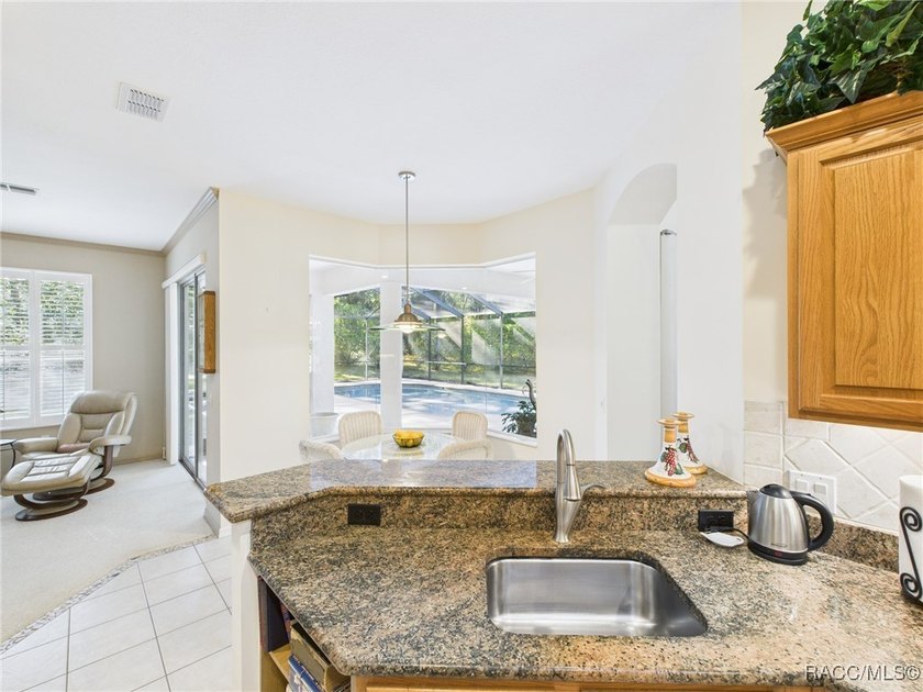 Beautiful Pool Home in Rainbow Springs Country Club Nestled in - photo 13