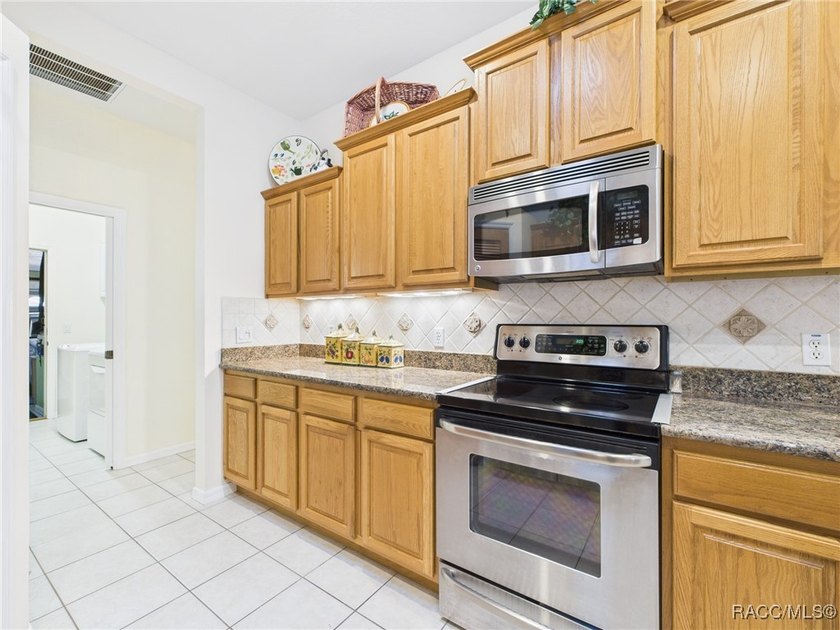 Beautiful Pool Home in Rainbow Springs Country Club Nestled in - photo 14