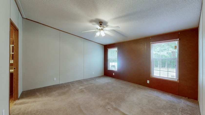 Home with 3.2 acres near lake with 3 campsites. - photo 13