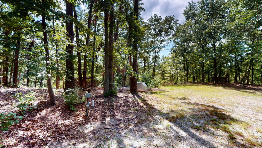 Home with 3.2 acres near lake with 3 campsites. - photo 27