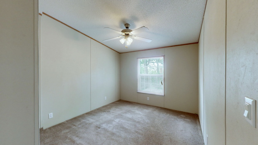 Home with 3.2 acres near lake with 3 campsites. - photo 21