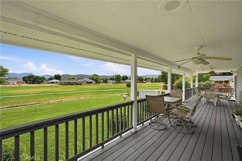 Meticulously maintained and beautifully landscaped, this - photo 3