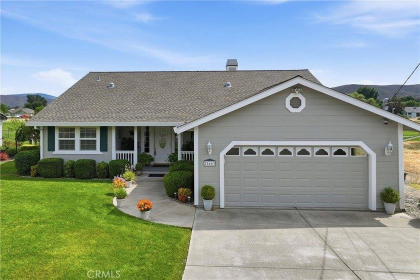 Meticulously maintained and beautifully landscaped, this - photo 8