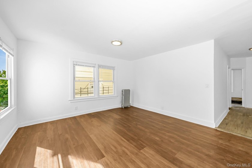 Beautifully renovated legal two-family home offering updates - photo 4