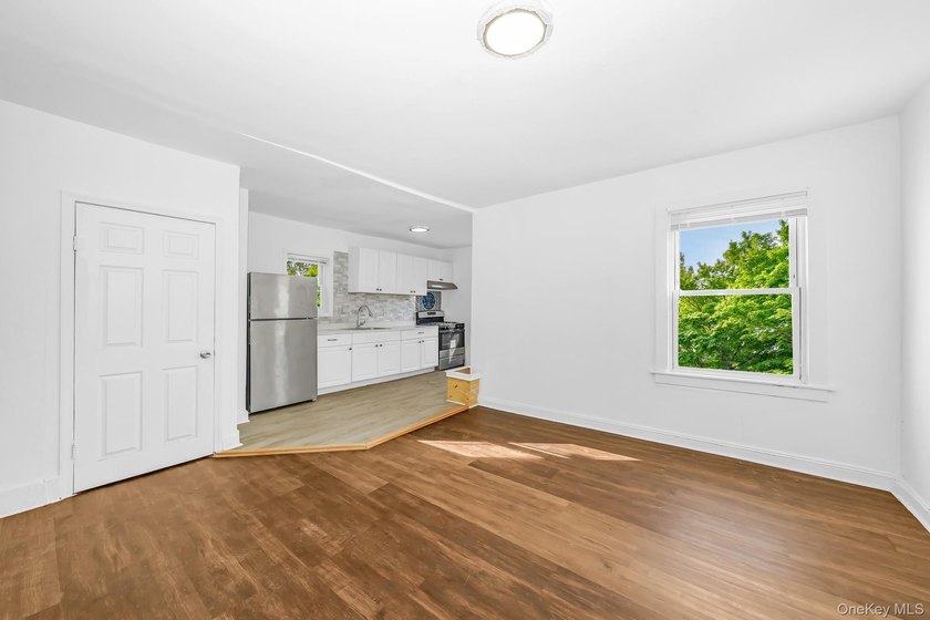Beautifully renovated legal two-family home offering updates - photo 5