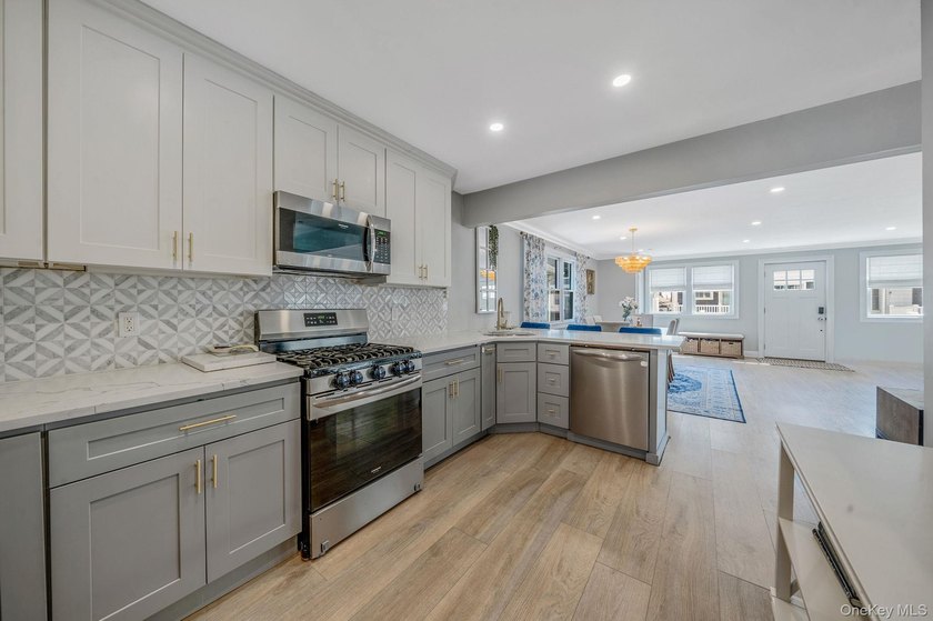 Just over one block from the beach, this fully renovated home - photo 10