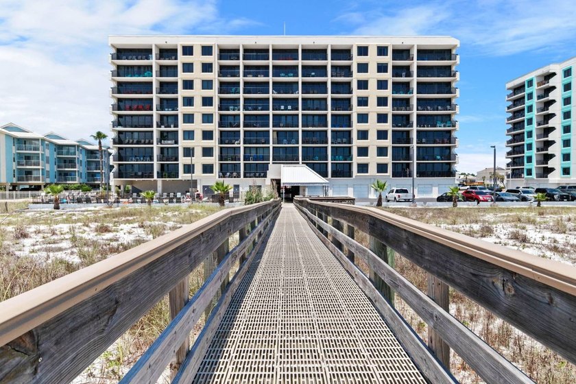 Beachfront living meets fresh coastal style in this updated - photo 34