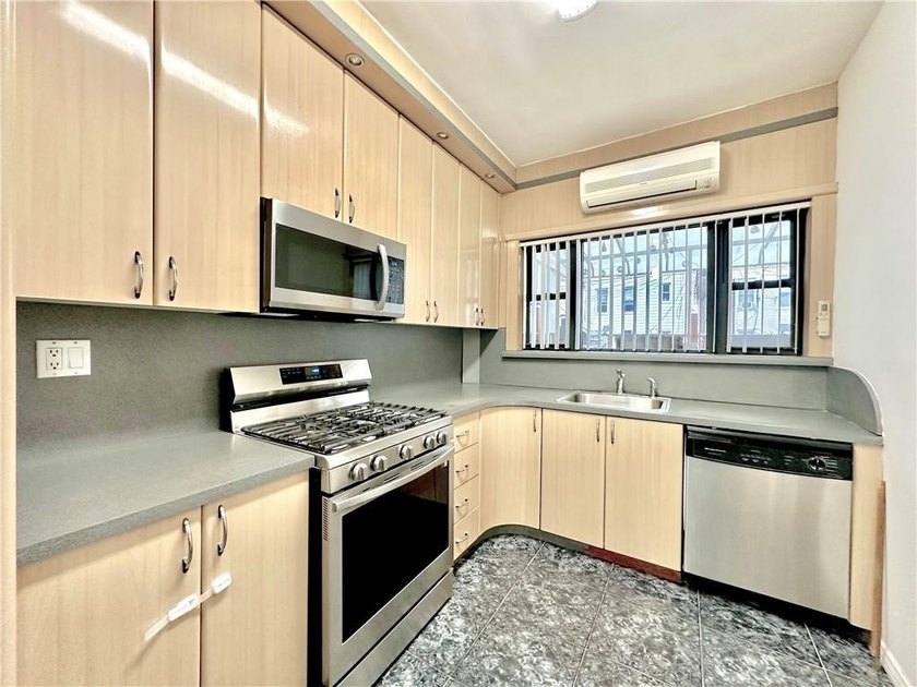 Welcome to 4388 Bedford Avenue, a beautifully maintained brick - photo 11