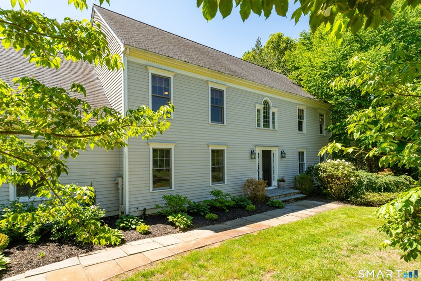 Beautifully sited on a fabulous private lot in the highly - photo 31