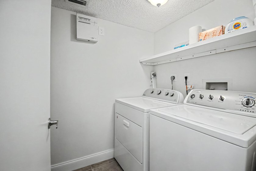 Renovated with timeless style, this beautifully appointed 2 - photo 27