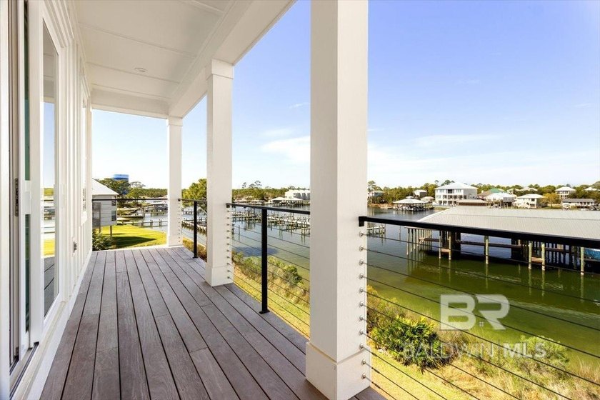 Discover luxury waterfront living in this beautifully appointed - photo 25