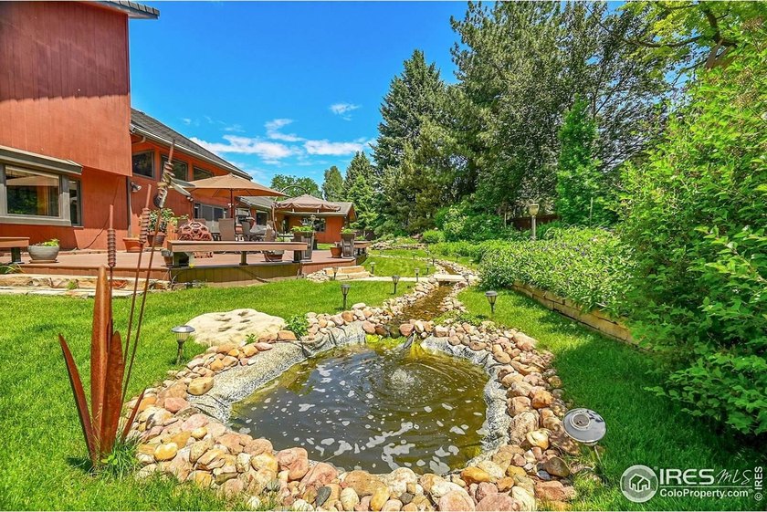 This exceptional custom home sits directly across from the - photo 38