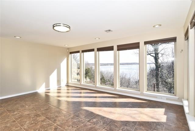 A stunning lake view welcome's you the moment you step inside - photo 17