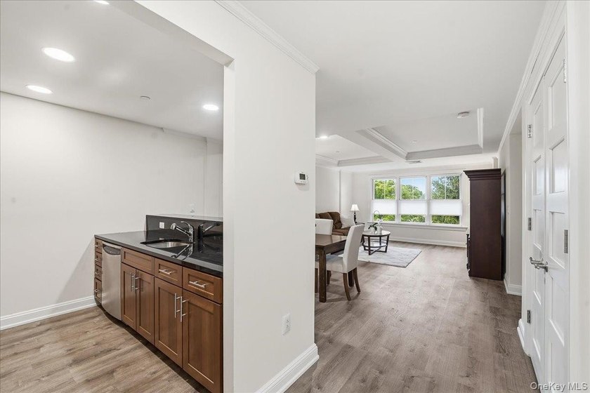 A refined one-bedroom residence at Sweetwater offering - photo 6