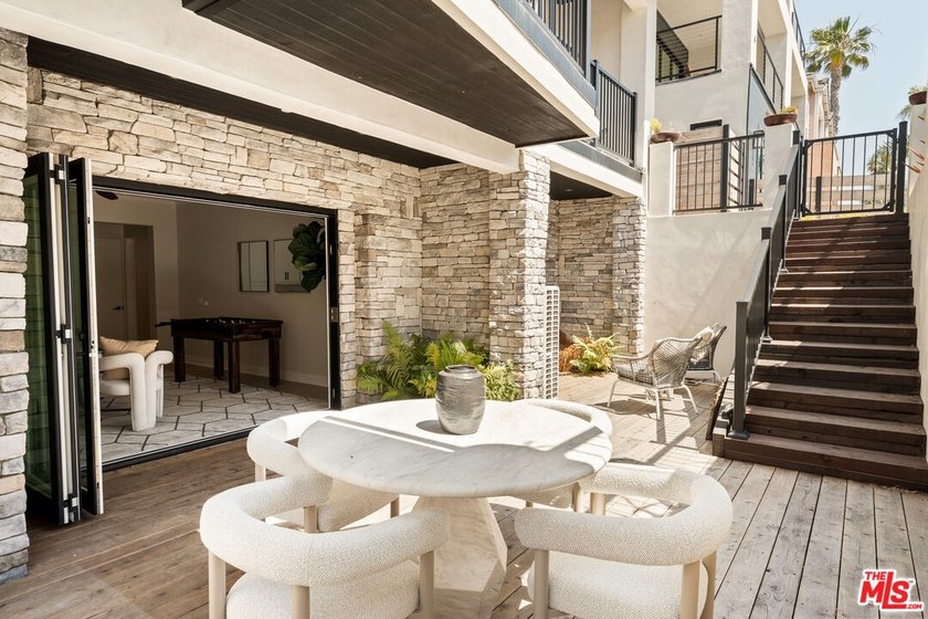 Experience refined coastal living in this new construction just - photo 14