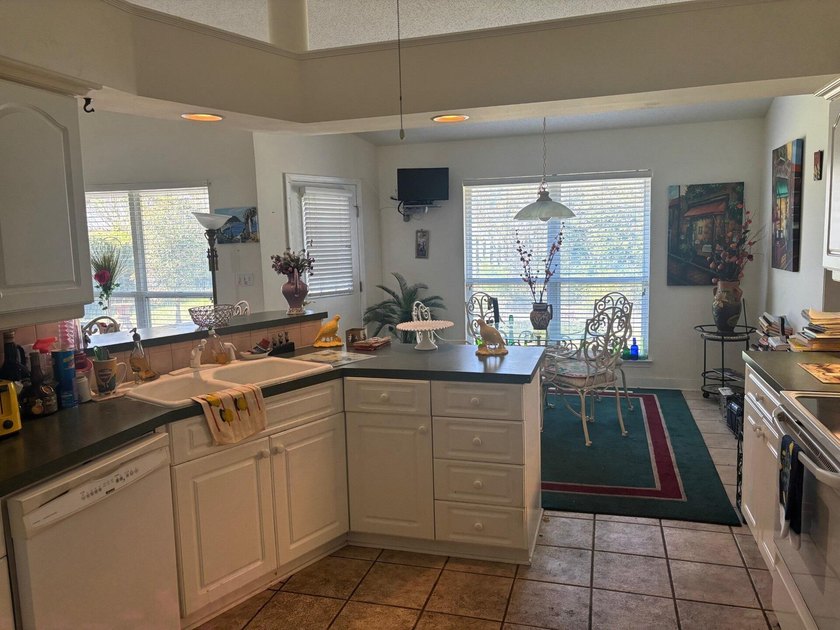 Located in the highly desirable Indian Lake community, this - photo 4