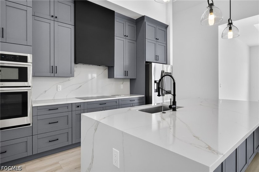 Triple lot new construction single-family home located in one of - photo 11