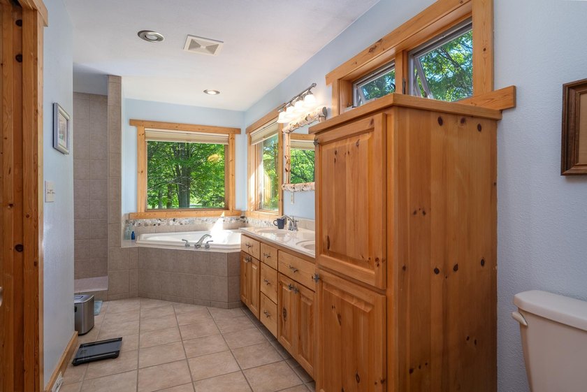 Experience refined Northwoods living in this impressive 4-bed - photo 30