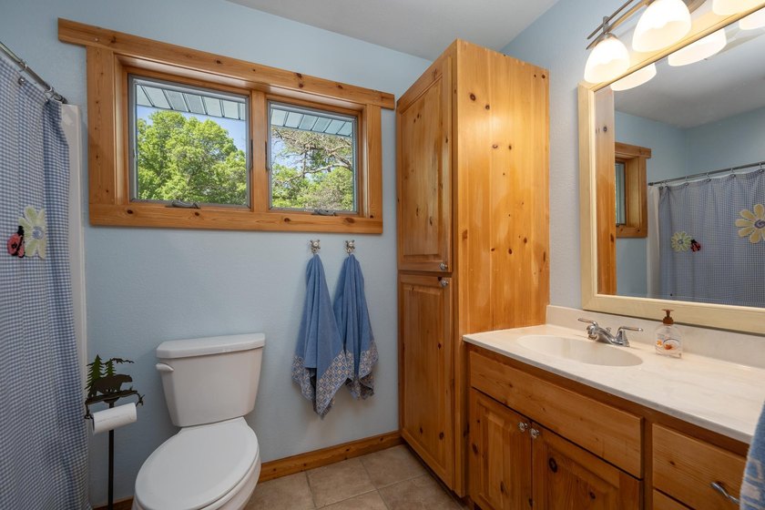 Experience refined Northwoods living in this impressive 4-bed - photo 35