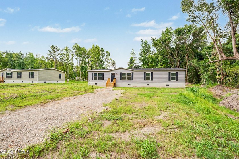 BRAND NEW mobile home with .5 acres! This spacious 4-bedroom - photo 3