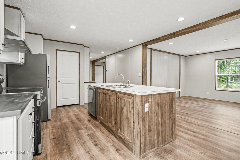 BRAND NEW mobile home with .5 acres! This spacious 4-bedroom - photo 8