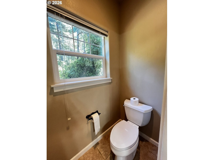 Nestled in a peaceful wooded setting within the desirable Heceta - photo 29