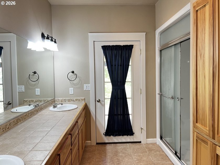 Nestled in a peaceful wooded setting within the desirable Heceta - photo 30