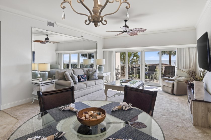 Experience coastal living at its finest with this gulf-front - photo 2