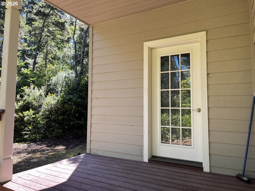 Nestled in a peaceful wooded setting within the desirable Heceta - photo 32