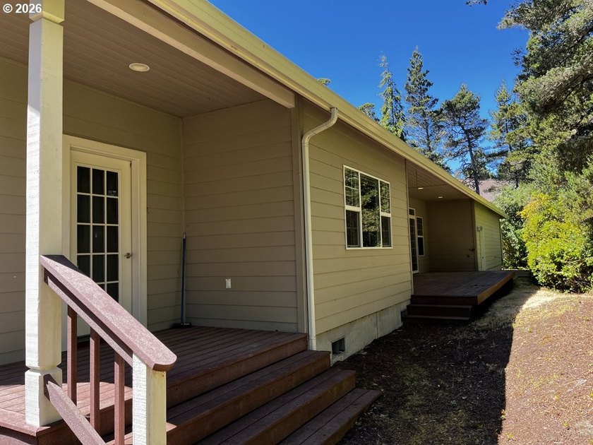 Nestled in a peaceful wooded setting within the desirable Heceta - photo 33