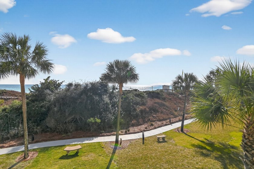 Experience coastal living at its finest with this gulf-front - photo 4