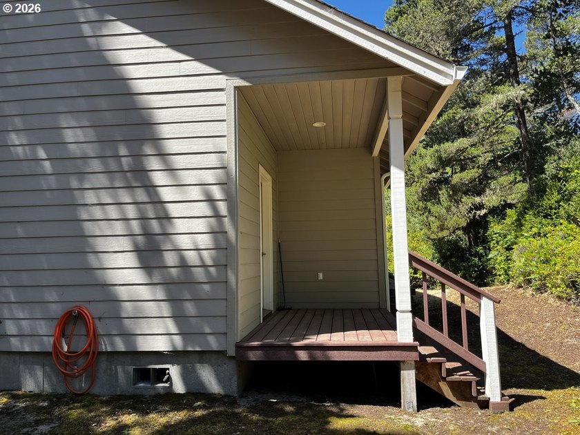 Nestled in a peaceful wooded setting within the desirable Heceta - photo 34